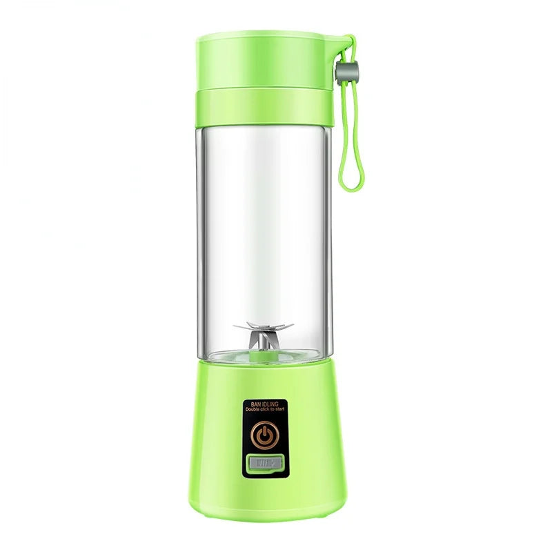 Green portable blender with clear container on a white background