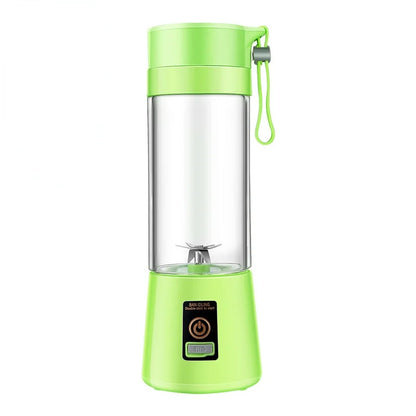 Green portable blender with clear container on a white background