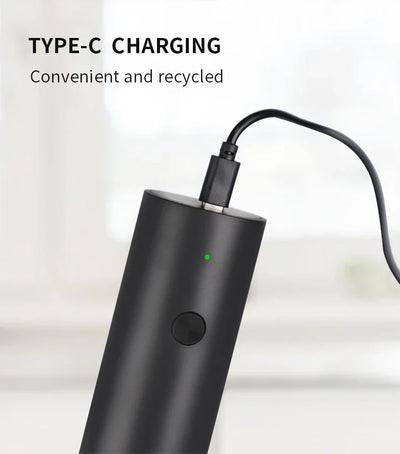 Black charging cable with Type-C connector on a light background