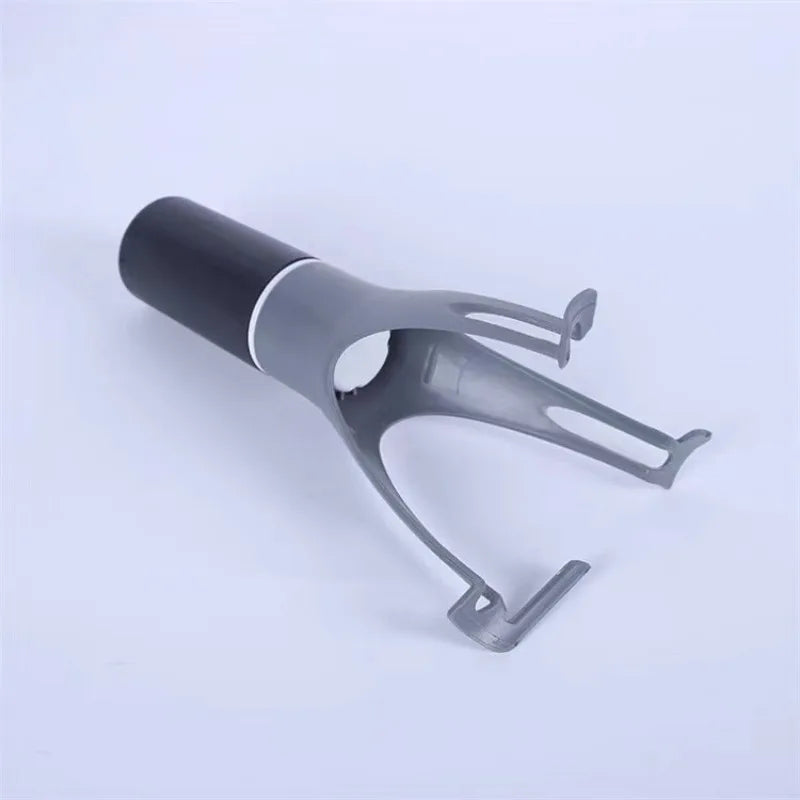Gray and black metal tool on a light blue background