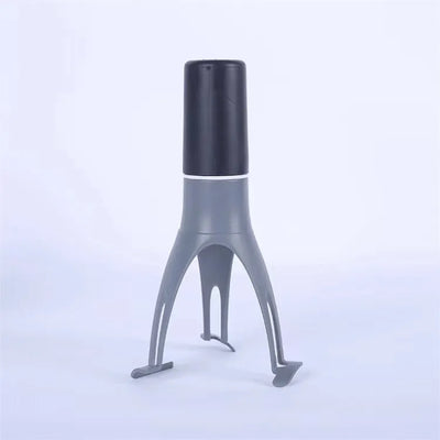 Black and gray cylindrical device with tripod-like legs on a light blue background